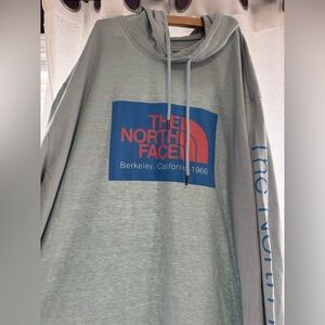 The North Face Men's Gray Hoodie with Blue and Red Logo